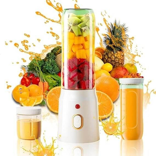 Blender with fruits and vegetables surrounded by juice splashes on a white background