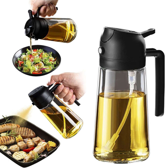Glass oil dispenser with black lid being used to drizzle oil over salad and grilled food.