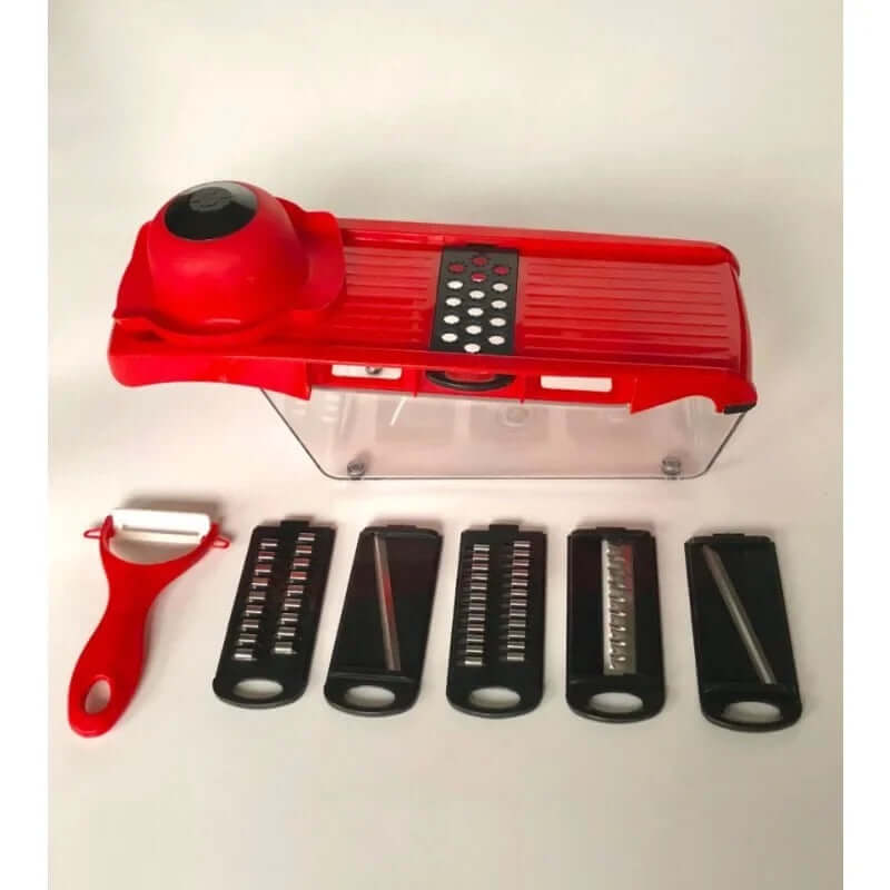 Red mandoline slicer with multiple blades and a peeler on a white background.Mandoline Vegetable Slicer and cutter