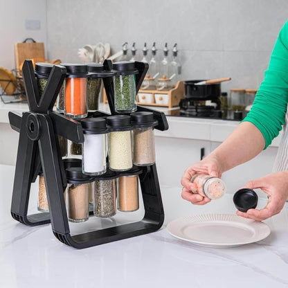 Black spice rack with various spices on a kitchen counter.spice rack organizer with jars